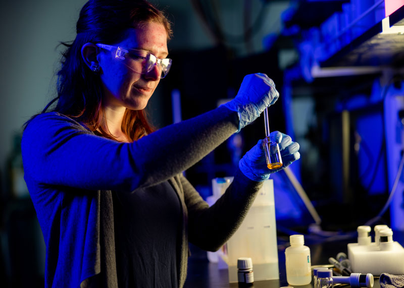A graduate student works in the Polymer Characterization Laboratory